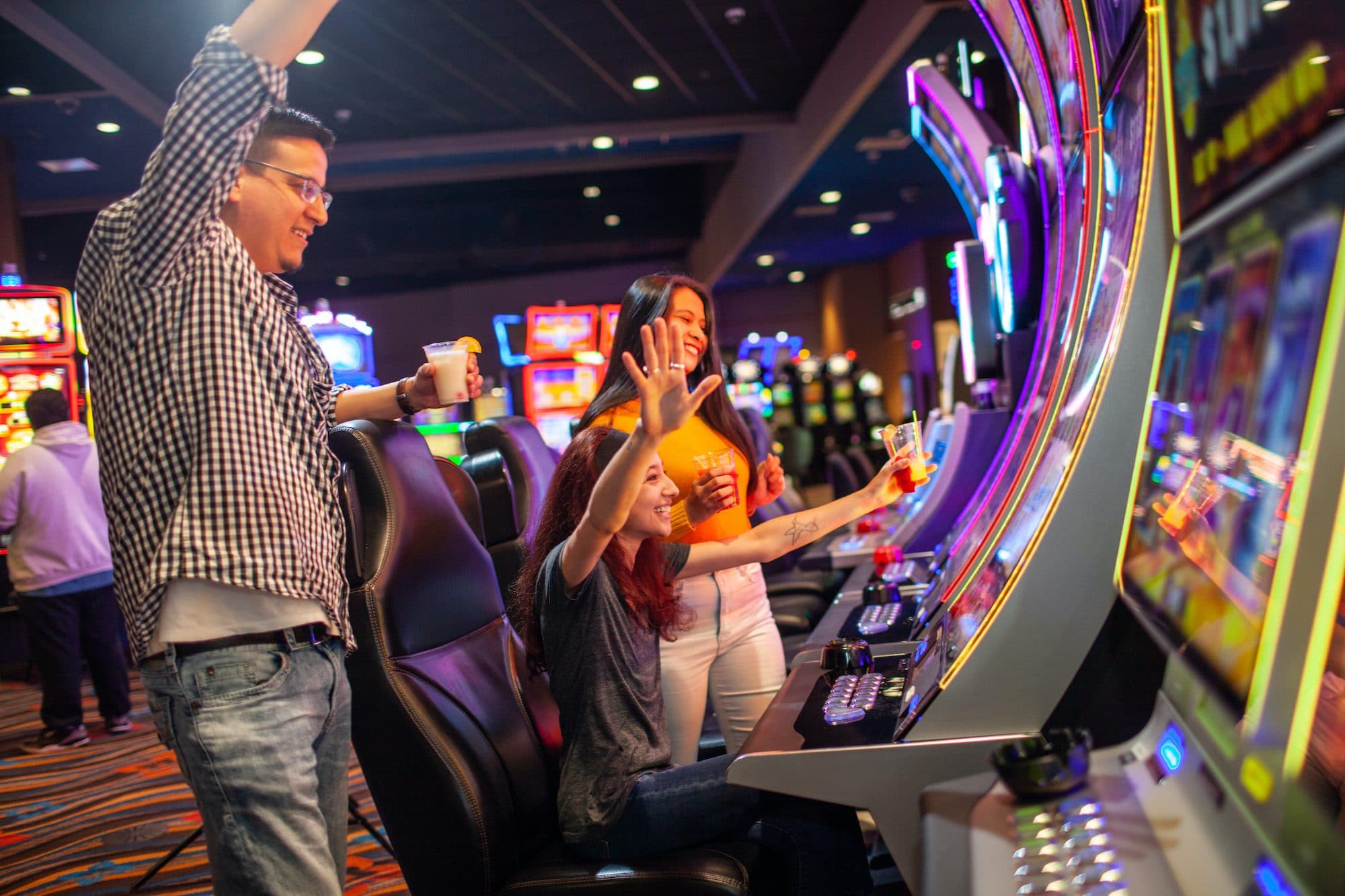 Guests celebrating a win on the Grand Portage casino floor